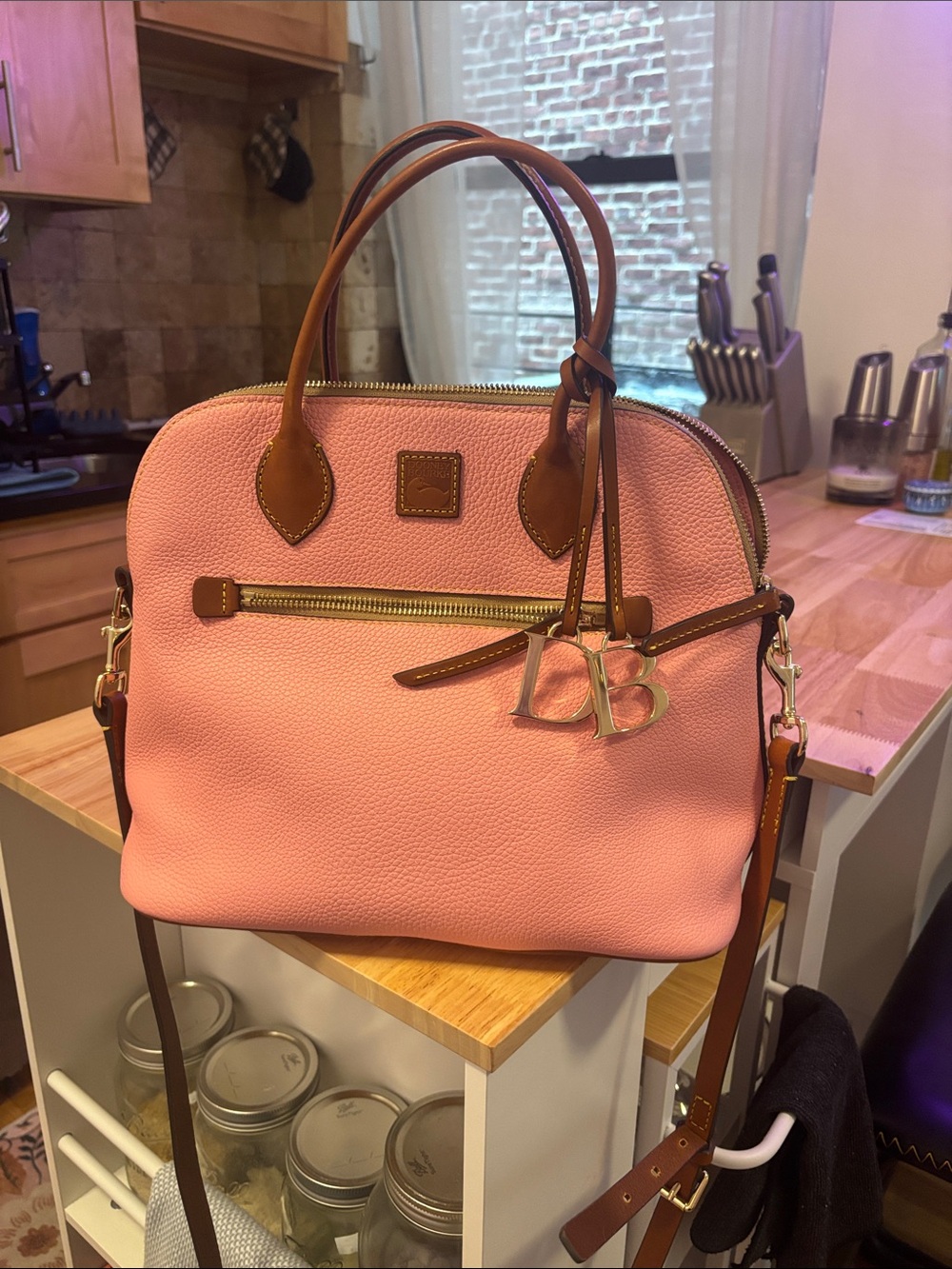 Pink Dooney and Bourke Leather Satchel with Brown Trim and Detachable Strap